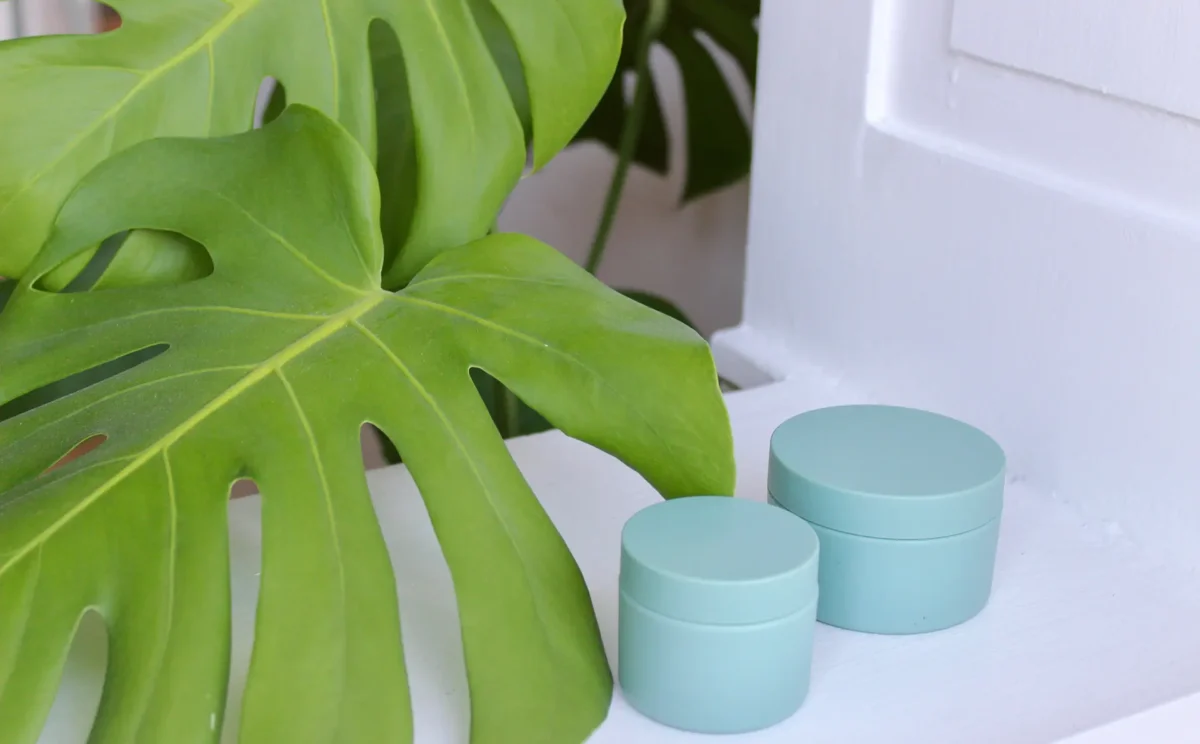Blue cream jars in monomaterial