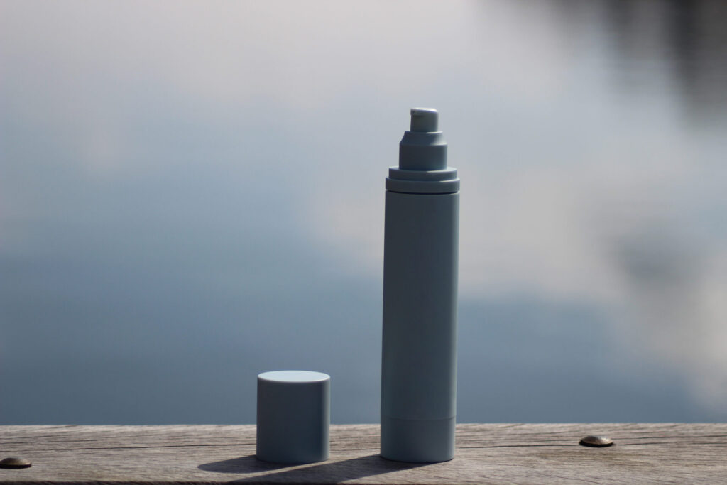 Blue airless bottle on bench