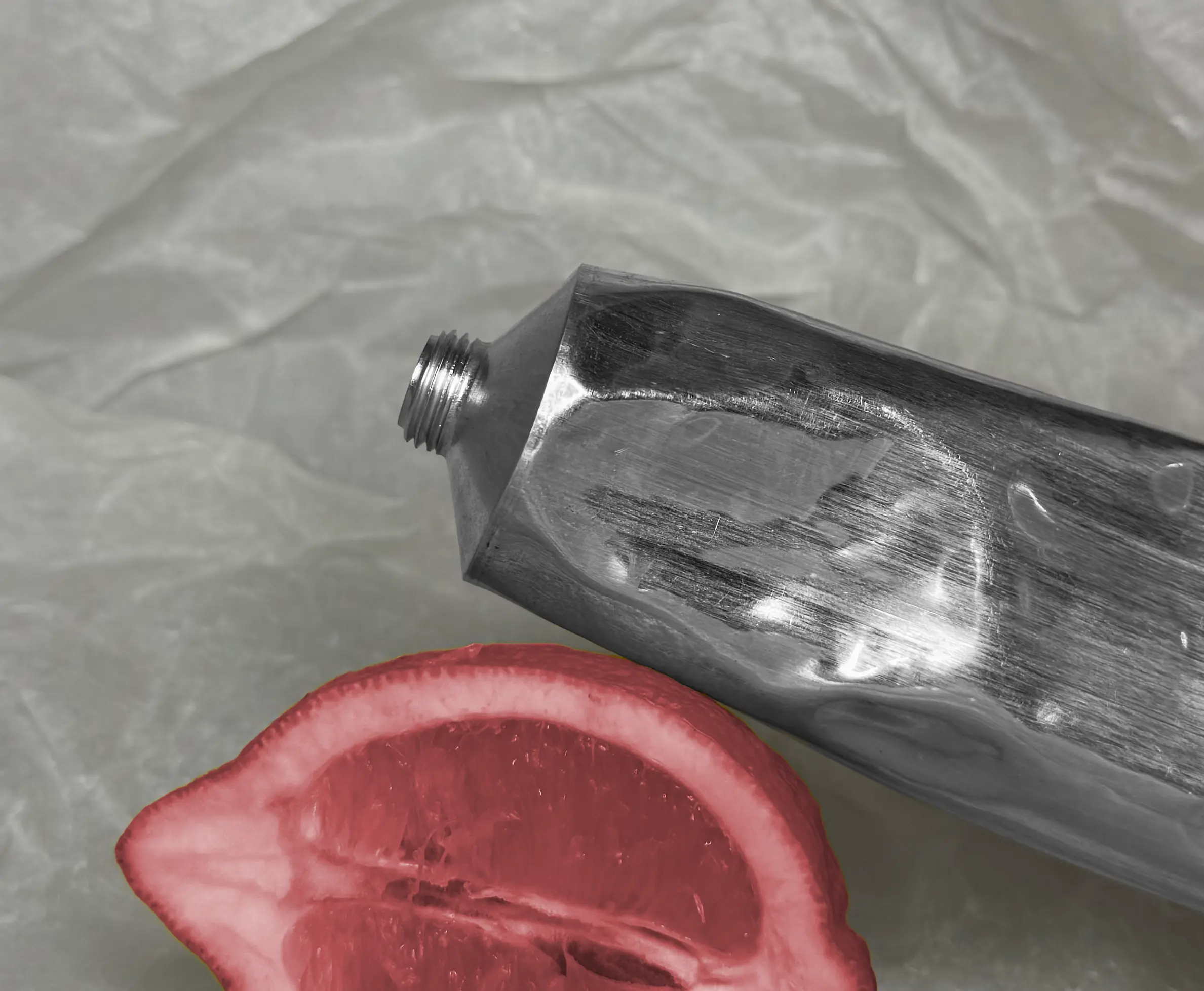 Tube on red fruit